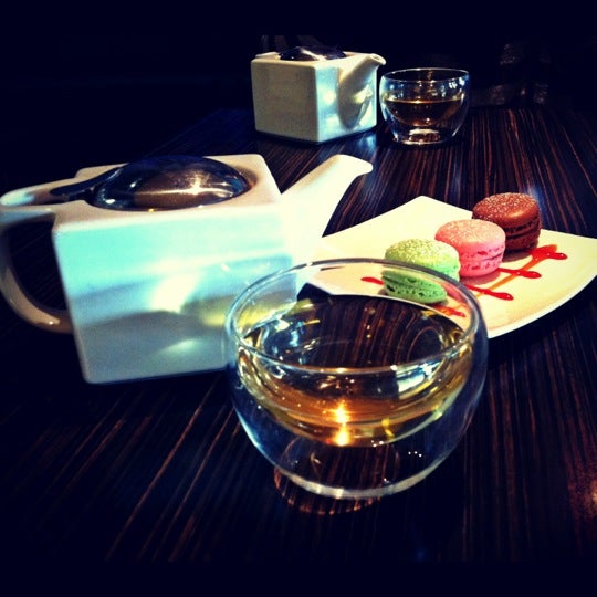 Photo taken at Tranquil Tea Lounge by L. L. on 1/21/2013