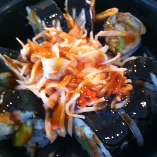 Photo taken at Rollbotto Sushi by Lance E. on 1/23/2012