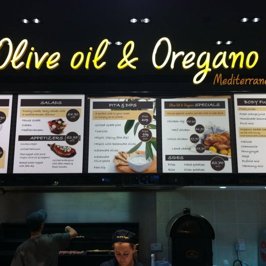Photo taken at Olive Oil &amp; Oregano by Spyros L. on 11/23/2011