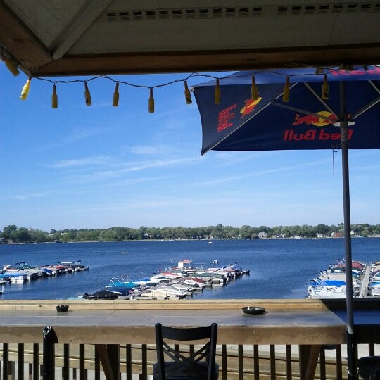 Photo taken at Docks Bar &amp; Grill by Kathryn R. on 9/11/2012