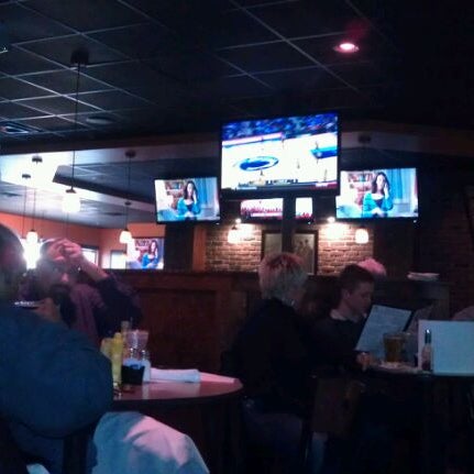 Photo taken at Coach&#39;s Bar and Grill by Ryan S. on 1/22/2012