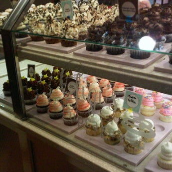 Photo taken at Gigi&#39;s Cupcakes by Kristopher V. on 12/14/2011