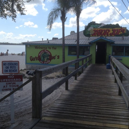 Photo taken at Gator Joe&#39;s Beach Bar &amp; Grill by Kris C. on 3/16/2012