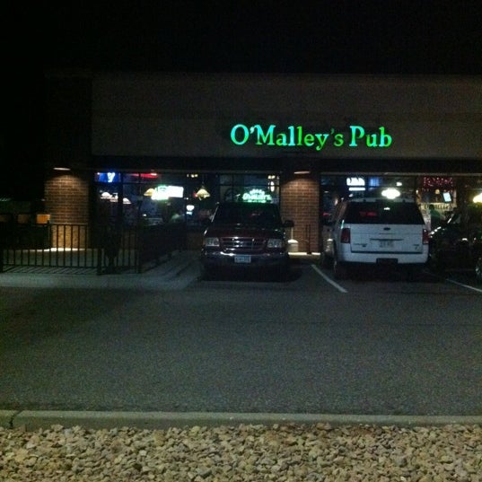 Photo taken at O&#39;Malley&#39;s Lucky Irish Pub by Emily on 10/22/2011