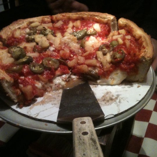 Photo taken at Giordano&#39;s by Elliot H. on 12/18/2011