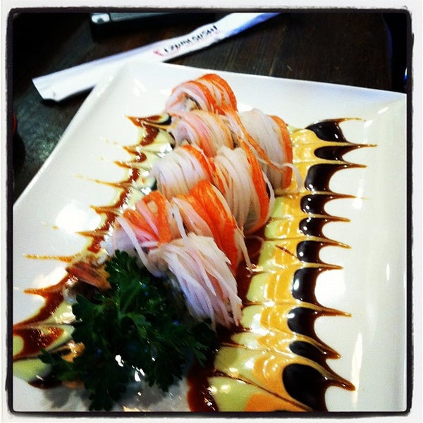 Photo taken at Izumi Sushi by Mike A. on 2/24/2012