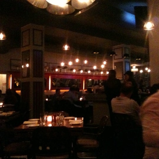 Photo taken at Steak Frites by Catherine W. on 5/19/2012