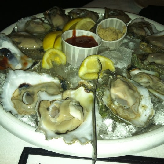 Photo taken at Christie&#39;s Seafood &amp; Steaks by Kimberly R. on 4/7/2012