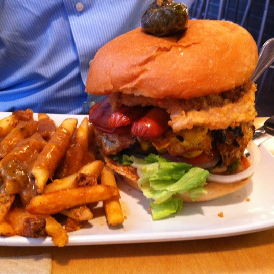 Photo taken at Crave Real Burgers by Beth L. on 7/26/2012