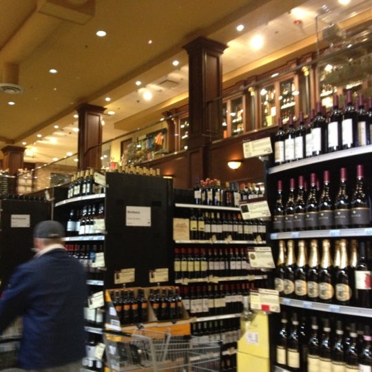 Photo taken at Wine Library by Maureen G. on 12/8/2012