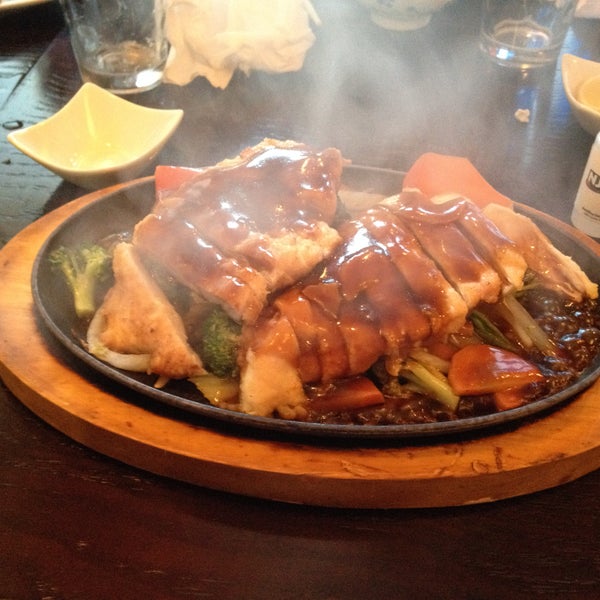 Salmon Teriyaki and chicken teriyaki, both served on hot metal plates so they came to the table sizzling like in a much fancier and expensive restaurant $50 for dinner for 4 with 3 appetizers.