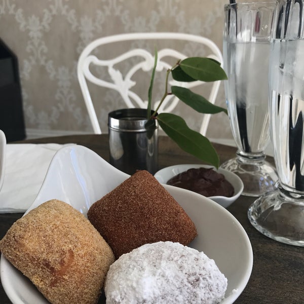 Get the sampler to try multiple flavors of their sweet beignets