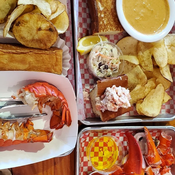 Photo taken at New England Lobster Market &amp; Eatery by Gabi K. on 8/30/2023