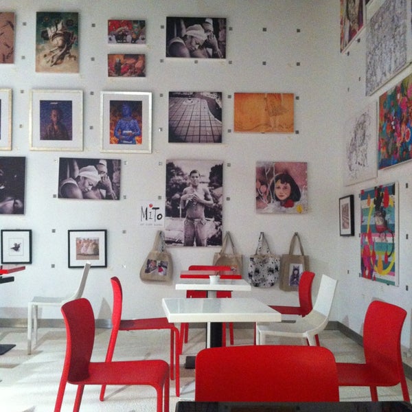 Photo taken at MiTo art café books by Julia I. on 12/30/2012