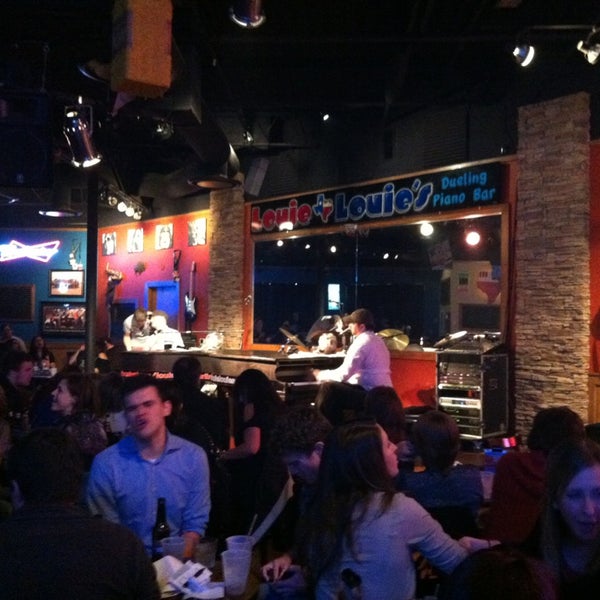 Photo taken at Louie Louie&#39;s Dueling Piano Bar by Lily L. on 1/26/2013