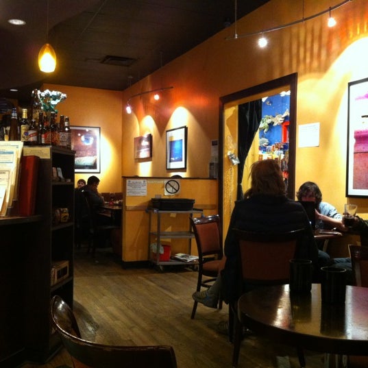 Photo taken at Rico&#39;s Cafe &amp; Wine Bar by Sarah S. on 12/14/2012