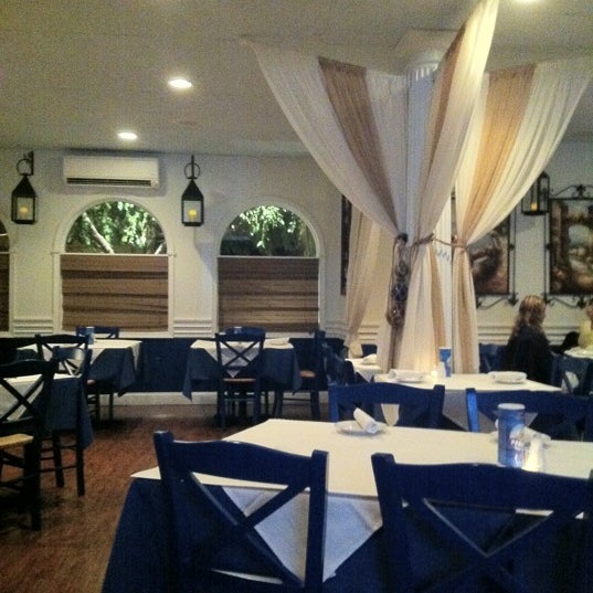 Photo taken at Yianni&#39;s Taverna by Tina B. on 9/17/2012