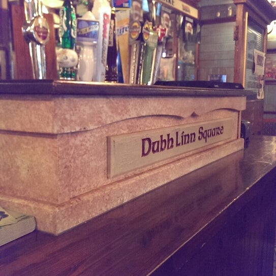 Photo taken at Dubh Linn Square Irish Pub by Josh D. on 3/30/2014