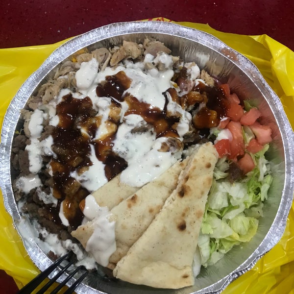 Photo taken at The Halal Guys by Benny W. on 7/30/2018