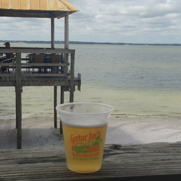 Photo taken at Gator Joe&#39;s Beach Bar &amp; Grill by Billy D. on 7/14/2013