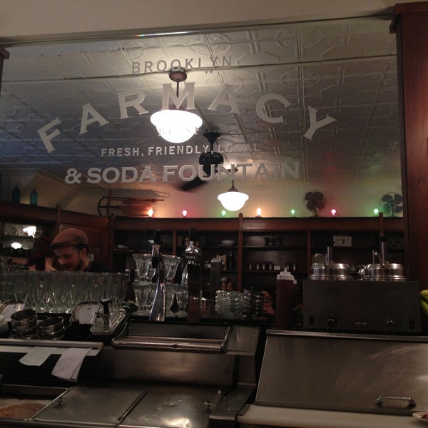 Photo taken at Brooklyn Farmacy &amp; Soda Fountain by Andrea J. on 5/19/2013