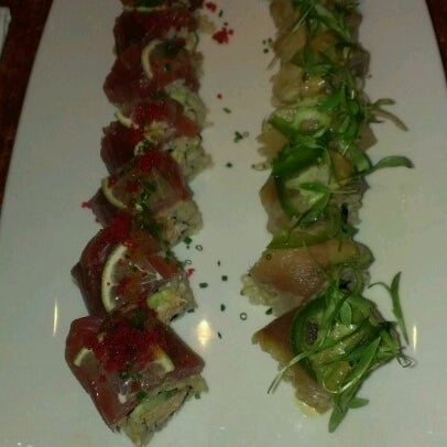 Photo taken at Roppongi Restaurant &amp; Sushi Bar by Juliana on 2/13/2013