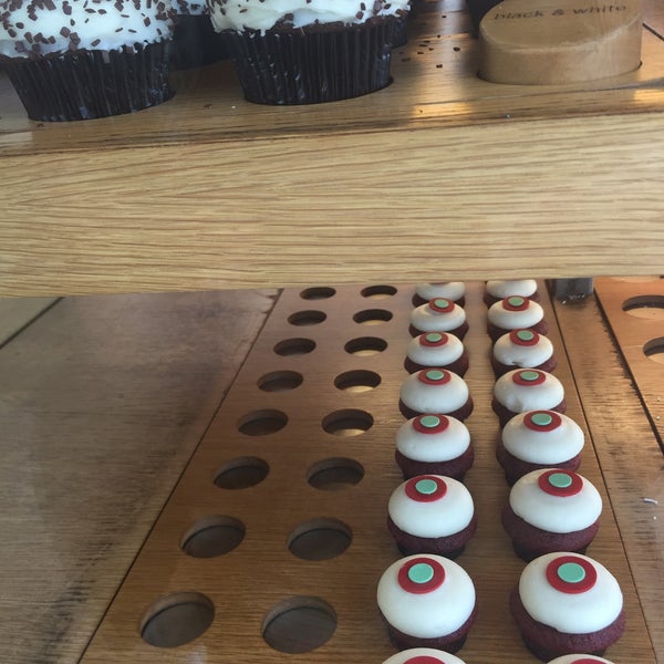 Photo taken at Sprinkles Cupcakes by lyza k. on 8/1/2018
