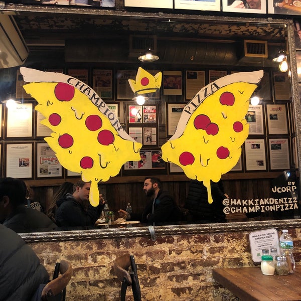 Photo taken at Champion Pizza by John L. on 1/1/2019