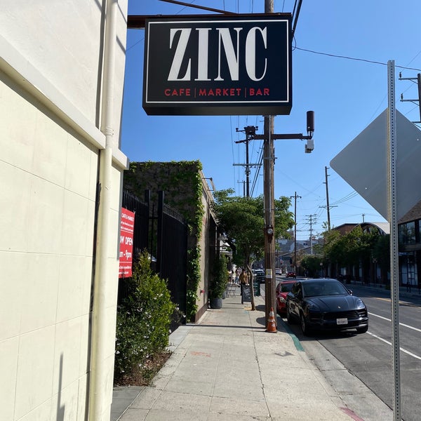 Photo taken at Zinc Café &amp; Market by R C. on 5/1/2022