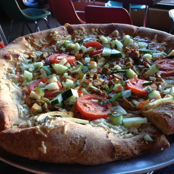 Photo taken at Mellow Mushroom by Natalie on 7/15/2013