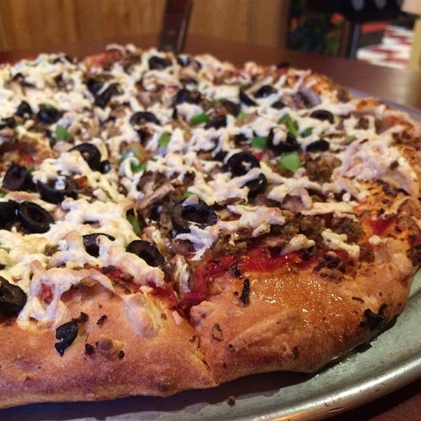 Снимок сделан в Rudy&#39;s Gourmet Pizza пользователем Natalie 7/22/2014