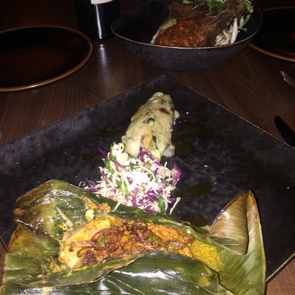 Duck appetizer is amazing... Also the salmon, which is served with Indian spices in a banana leaf.