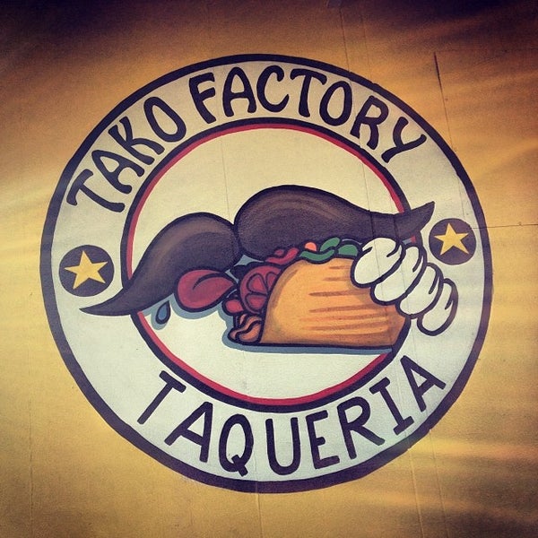 Photo taken at Tako Factory by Jerry J. on 12/6/2013