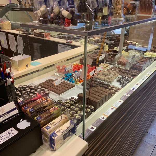 Photo taken at Leonidas Chocolate by Agnes P. on 2/23/2019