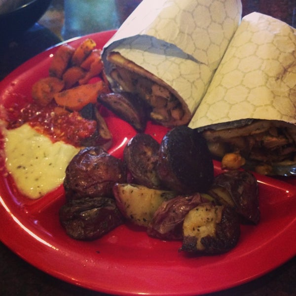 Photo taken at Poccadio Moroccan Grill &amp; Sandwiches by Erin M. on 3/30/2013