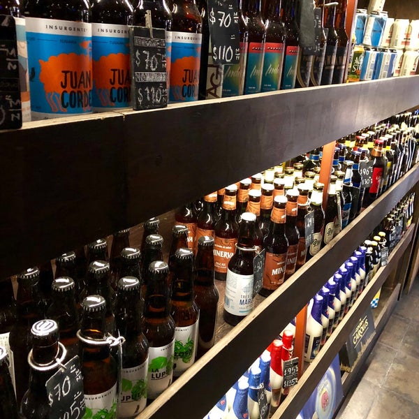 Photo taken at El Depósito World Beer Store by Fernando S. on 7/6/2018