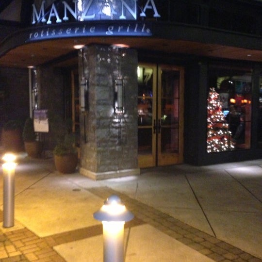Photo taken at Manzana Rotisserie Grill by Danny G. on 11/25/2012