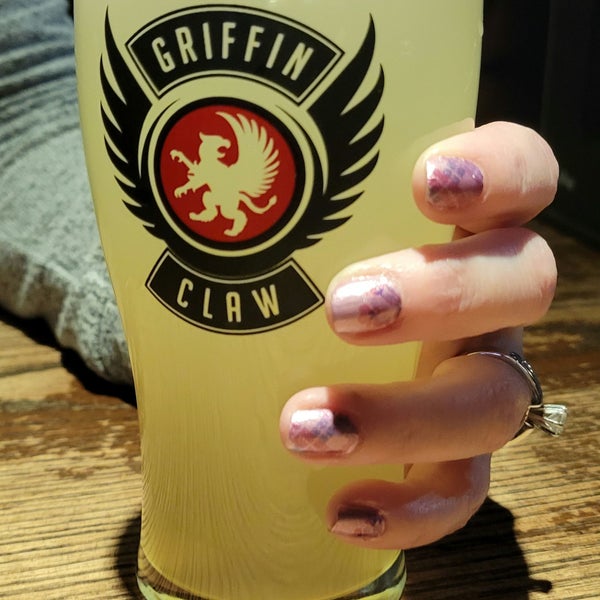 Photo taken at Griffin Claw Brewing Company by Eva H. on 3/28/2022