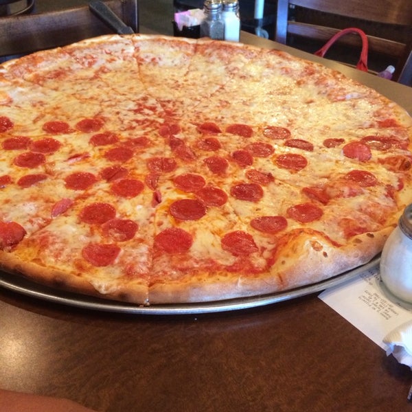Photo taken at Russo&#39;s New York Pizzeria by Mike H. on 5/3/2014