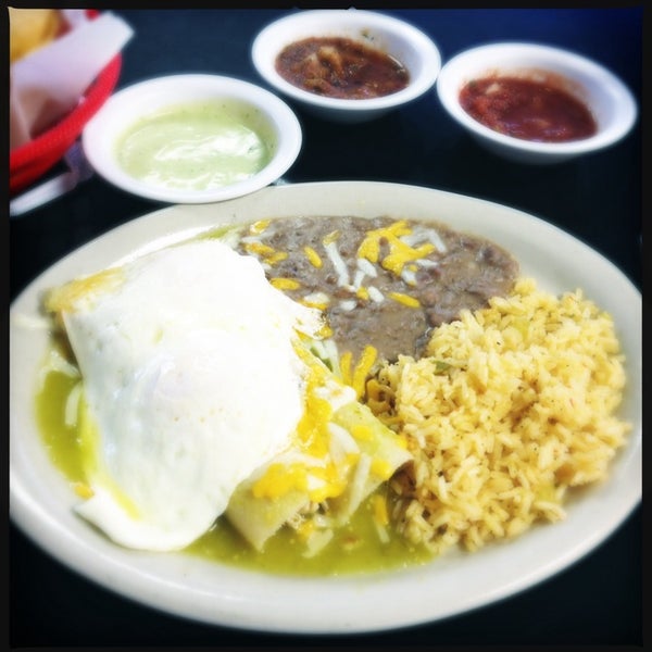 Enchiladas topped with fried eggs are the best!