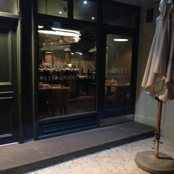 Foto diambil di Monty&#39;s Restaurant and Bar oleh Aigul K. pada 12/1/2013