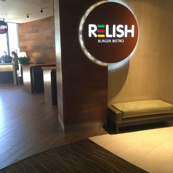 Photo taken at Relish Burger Bistro by Kevin L. on 7/6/2016