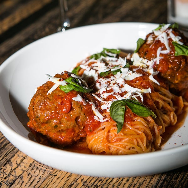 There's no question that Charlatan is a neighborhood gem serving incredible pastas. Expect moist meatballs the size of tennis balls, swaddled in a nest of al dente spaghettini.