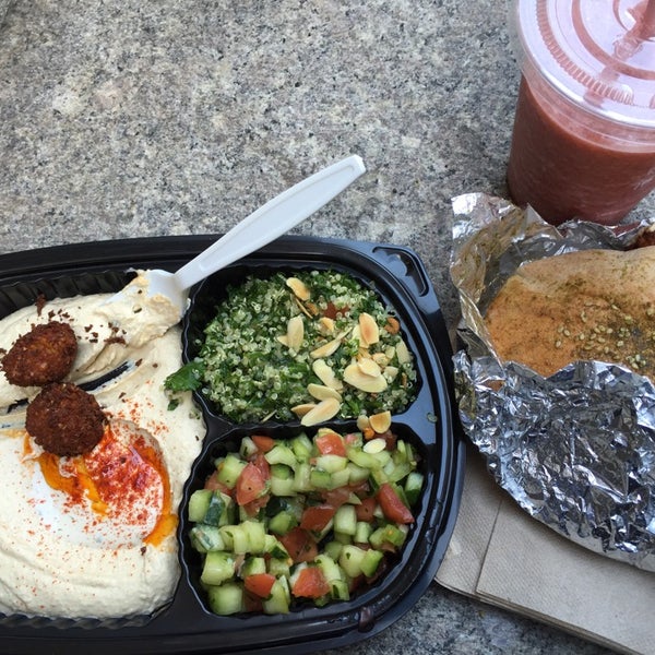 Photo taken at Taïm Mobile Falafel &amp; Smoothie Truck by Julian M. on 10/20/2014