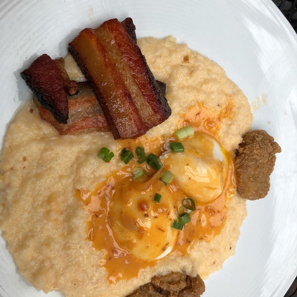 Cheese grits with duck eggs and pork belly.