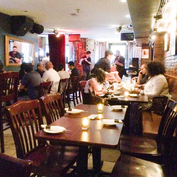 Photo taken at JoJo Restaurant &amp; Bar by Tim C. on 5/16/2015