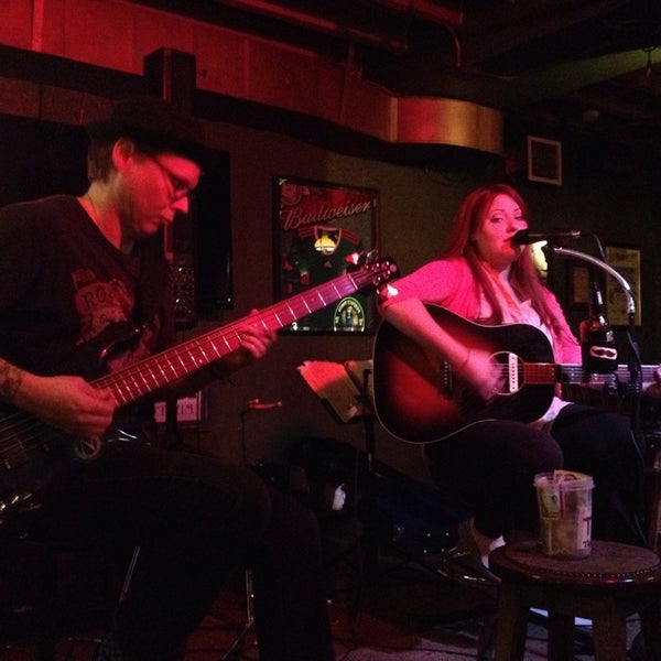 Photo taken at Ha&#39;Penny Bridge Irish Pub &amp; Grill by Chris G. on 3/22/2014