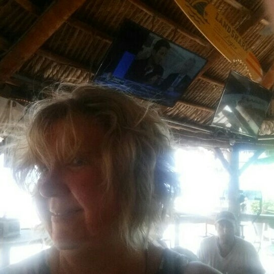 Foto diambil di Bamboo Beach Tiki Bar &amp; Cafe oleh Nancy A. pada 7/18/2016