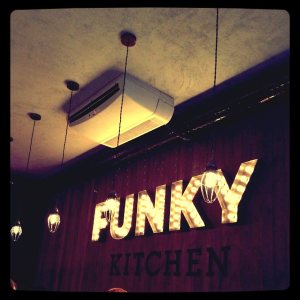 Photo taken at Funky Kitchen by Dasha S. on 5/2/2013