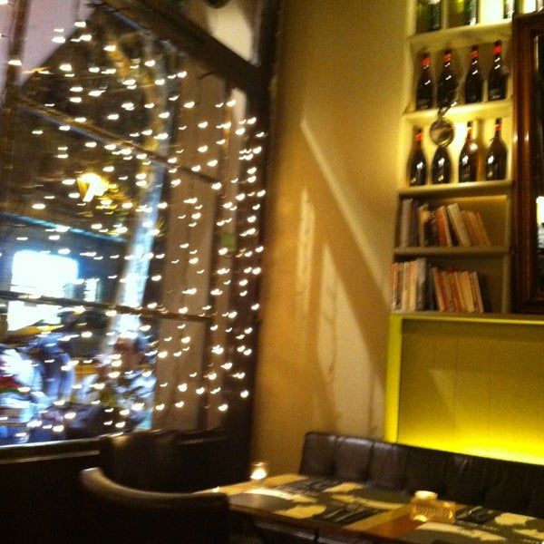 Photo taken at Café Adonis 1940 by Marta M. on 12/18/2012